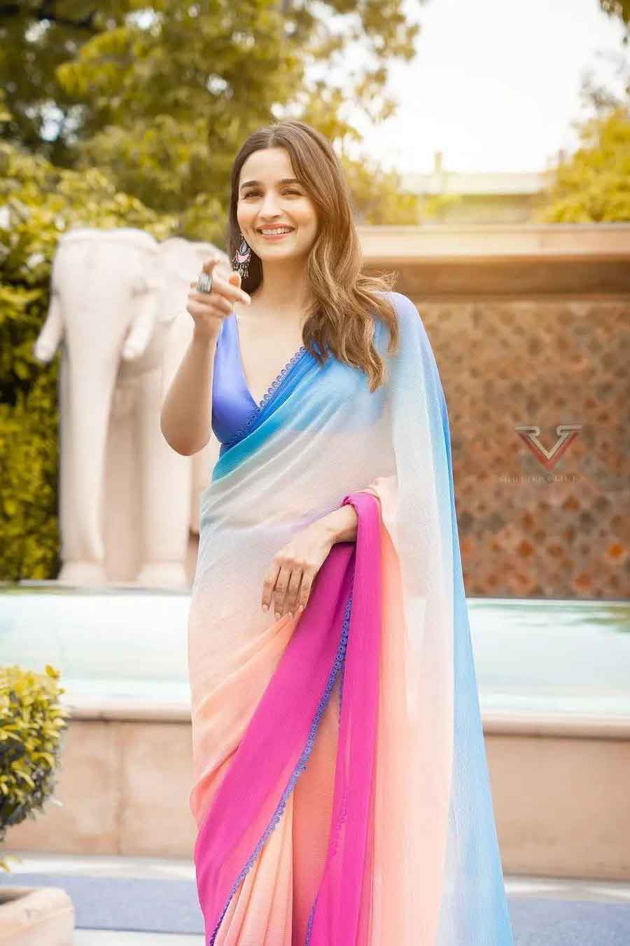 Explore our latest collection of hand-dyed chiffon sarees, inspired by Bollywood actress Alia Bhatt. These fancy, elegant sarees feature the most popular ombre-dyed and tie-and-dye designs. Discover the latest trends in sarees for 2023, showcasing the beautiful and unique work of designer Manish Malhotra.