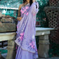 Hand-Painted Lavender Crepe Chiffon Saree with Fuchsia Flowers and Pigeons - Sequin and Bead Embroidery. Perfect for Party Wear, Engagement, or Farewell Saree Look. This Pure Silk Saree Features Exquisite Cloth Painting and Textile Paint for Fabric. Elevate Your Saree Style with Traditional and Stylish Indian Saree Design
