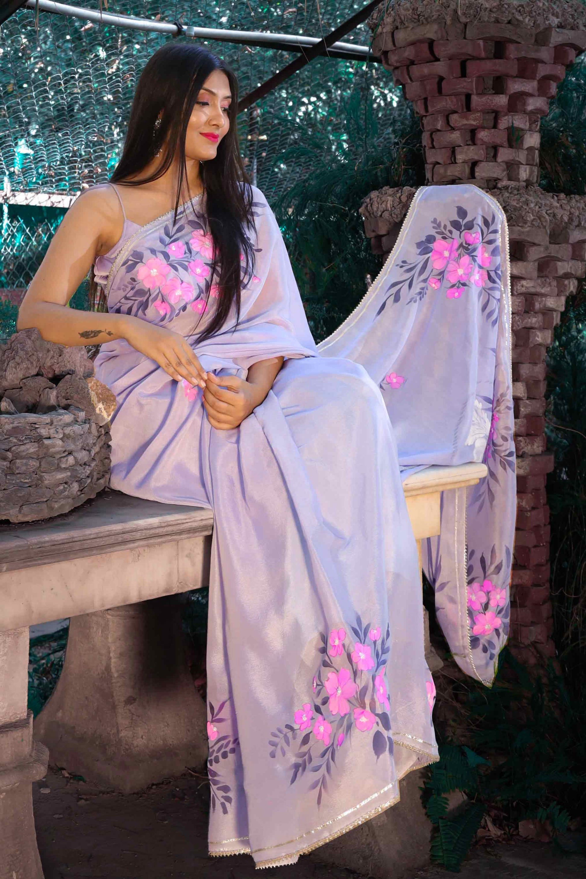 Hand-Painted Lavender Crepe Chiffon Saree with Fuchsia Flowers and Pigeons - Sequin and Bead Embroidery. Perfect for Party Wear, Engagement, or Farewell Saree Look. This Pure Silk Saree Features Exquisite Cloth Painting and Textile Paint for Fabric. Elevate Your Saree Style with Traditional and Stylish Indian Saree Design