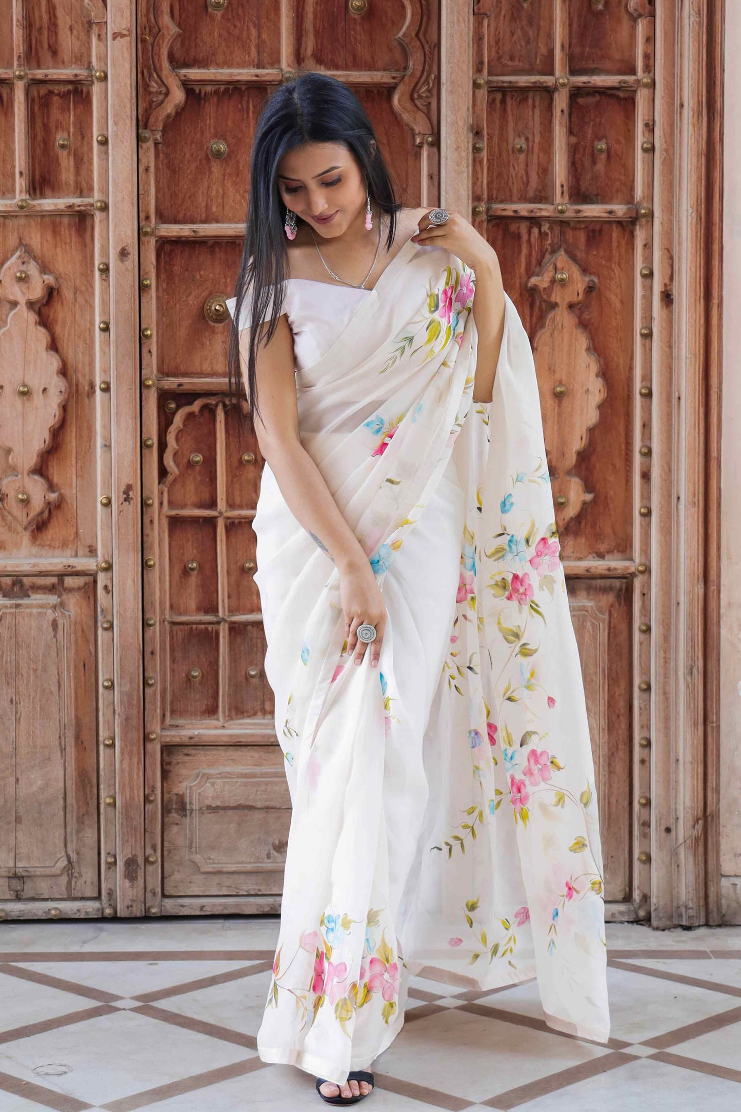 Off-White Organza Saree with Hand-Painted Multi-Color Flowers and Sequin Embroidery - Perfect for a Party, Farewell, or Any Occasion - Latest Saree Blouse Designs - Organza Saree Party Wear - Floral Organza Saree - Easy Hand-Painted Saree Design - Hand Painting on Saree - Elegant Hand-Painted Saree Look
