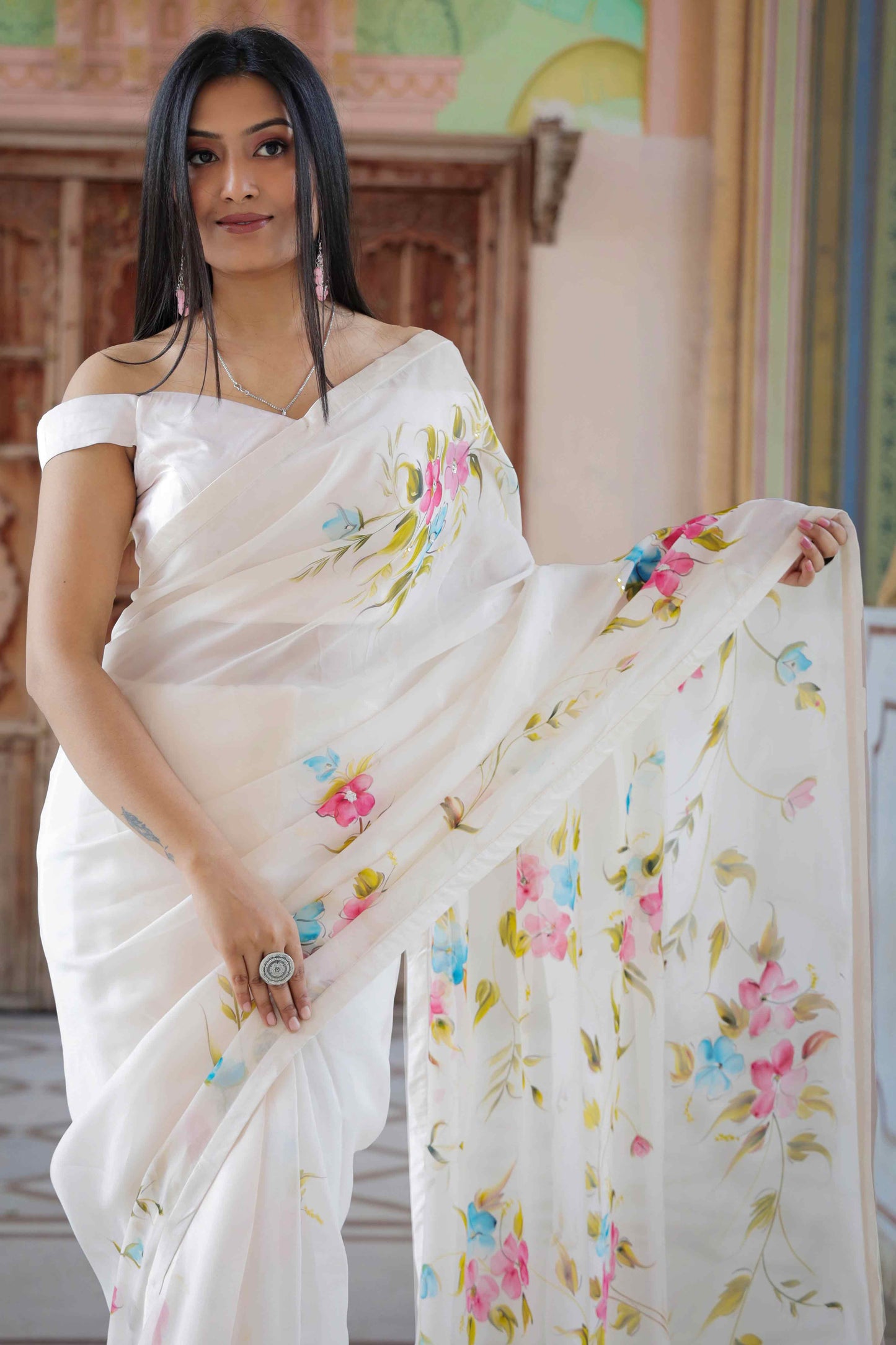 Off-White Organza Saree with Hand-Painted Multi-Color Flowers and Sequin Embroidery - Perfect for a Party, Farewell, or Any Occasion - Latest Saree Blouse Designs - Organza Saree Party Wear - Floral Organza Saree - Easy Hand-Painted Saree Design - Hand Painting on Saree - Elegant Hand-Painted Saree Look