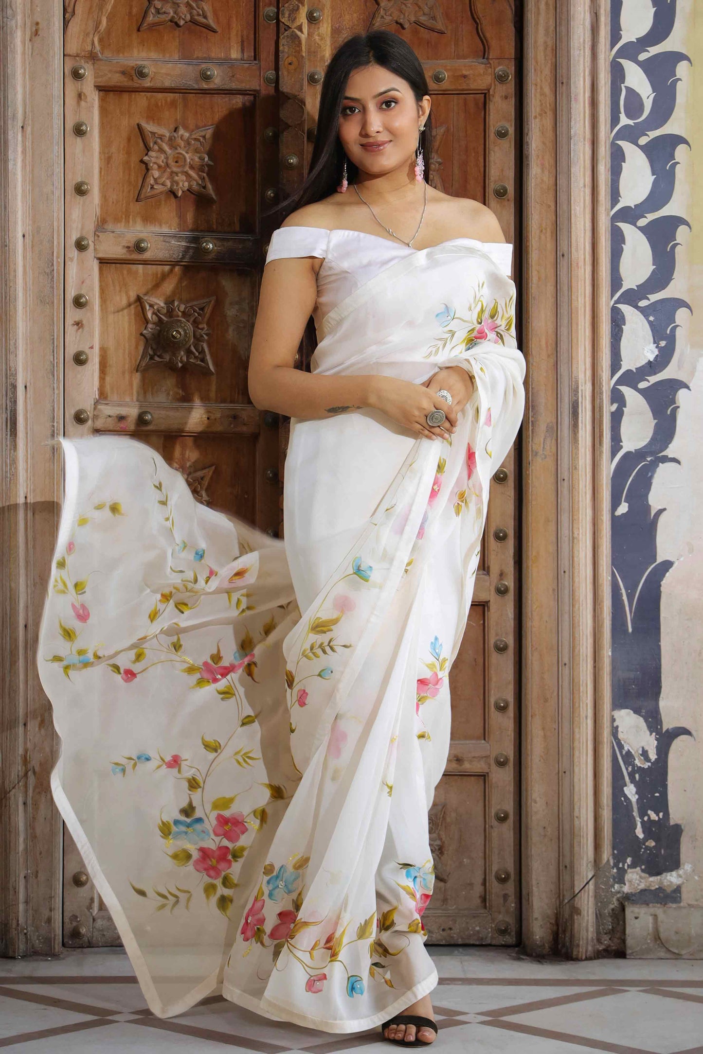 Off-White Organza Saree with Hand-Painted Multi-Color Flowers and Sequin Embroidery - Perfect for a Party, Farewell, or Any Occasion - Latest Saree Blouse Designs - Organza Saree Party Wear - Floral Organza Saree - Easy Hand-Painted Saree Design - Hand Painting on Saree - Elegant Hand-Painted Saree Look