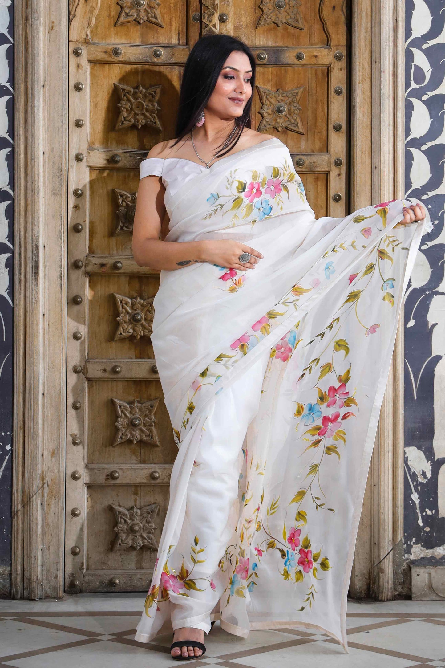 Off-White Organza Saree with Hand-Painted Multi-Color Flowers and Sequin Embroidery - Perfect for a Party, Farewell, or Any Occasion - Latest Saree Blouse Designs - Organza Saree Party Wear - Floral Organza Saree - Easy Hand-Painted Saree Design - Hand Painting on Saree - Elegant Hand-Painted Saree Look