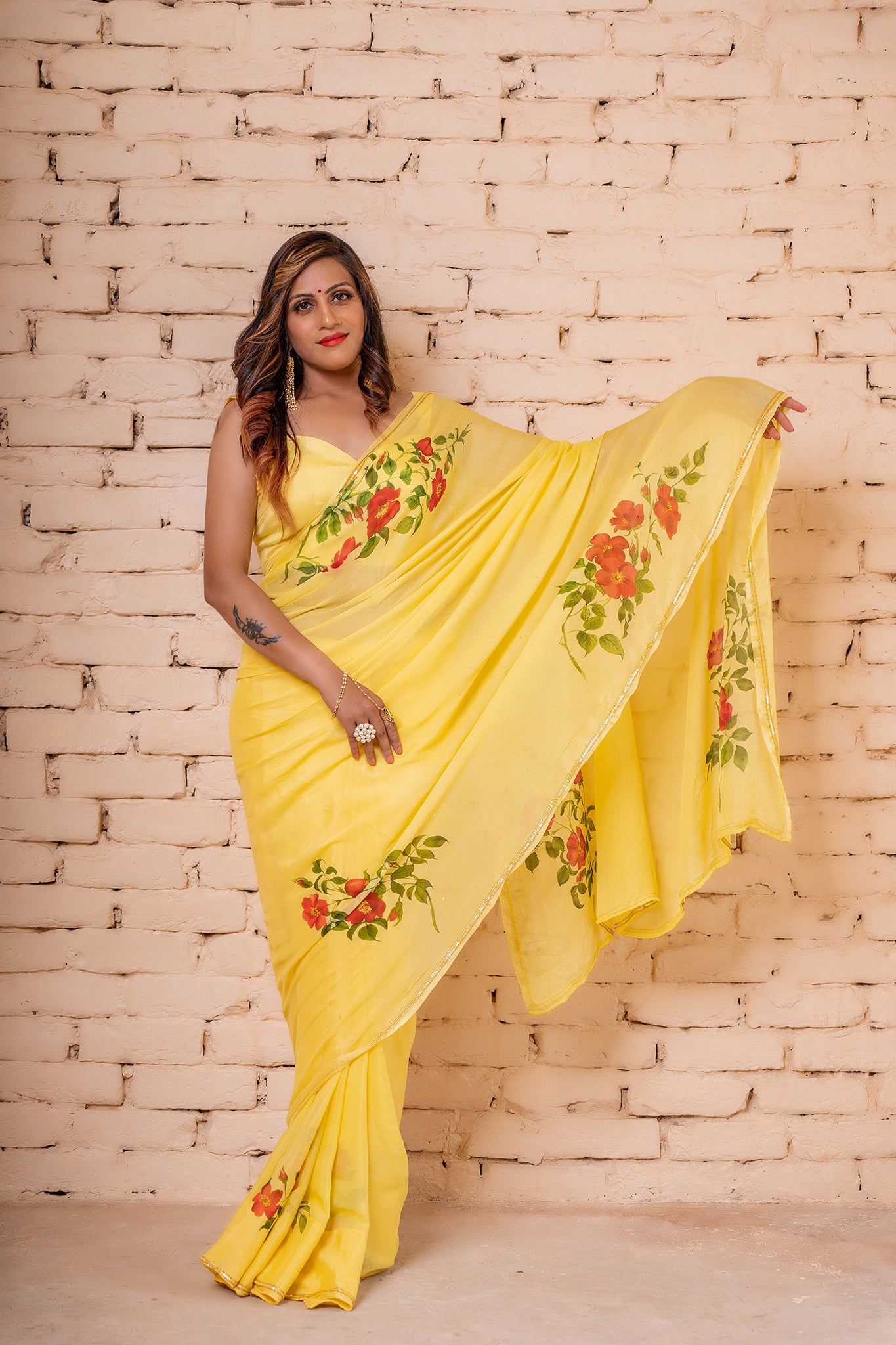 Explore our hand-painted sarees, a fusion of artistry and elegance. Find the perfect hand-paint sari, whether it's a floral chiffon saree for a funky look or a beautiful handloom saree that's trending now. Elevate your style with a Bollywood saree or go rustic with a crêpe silk embroidered saree. Discover the finest in craftsmanship and fashion.