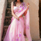 hand painted hibiscus flowers on soft pink chiffon  saree enhanced with sequin and pearl embroidery.