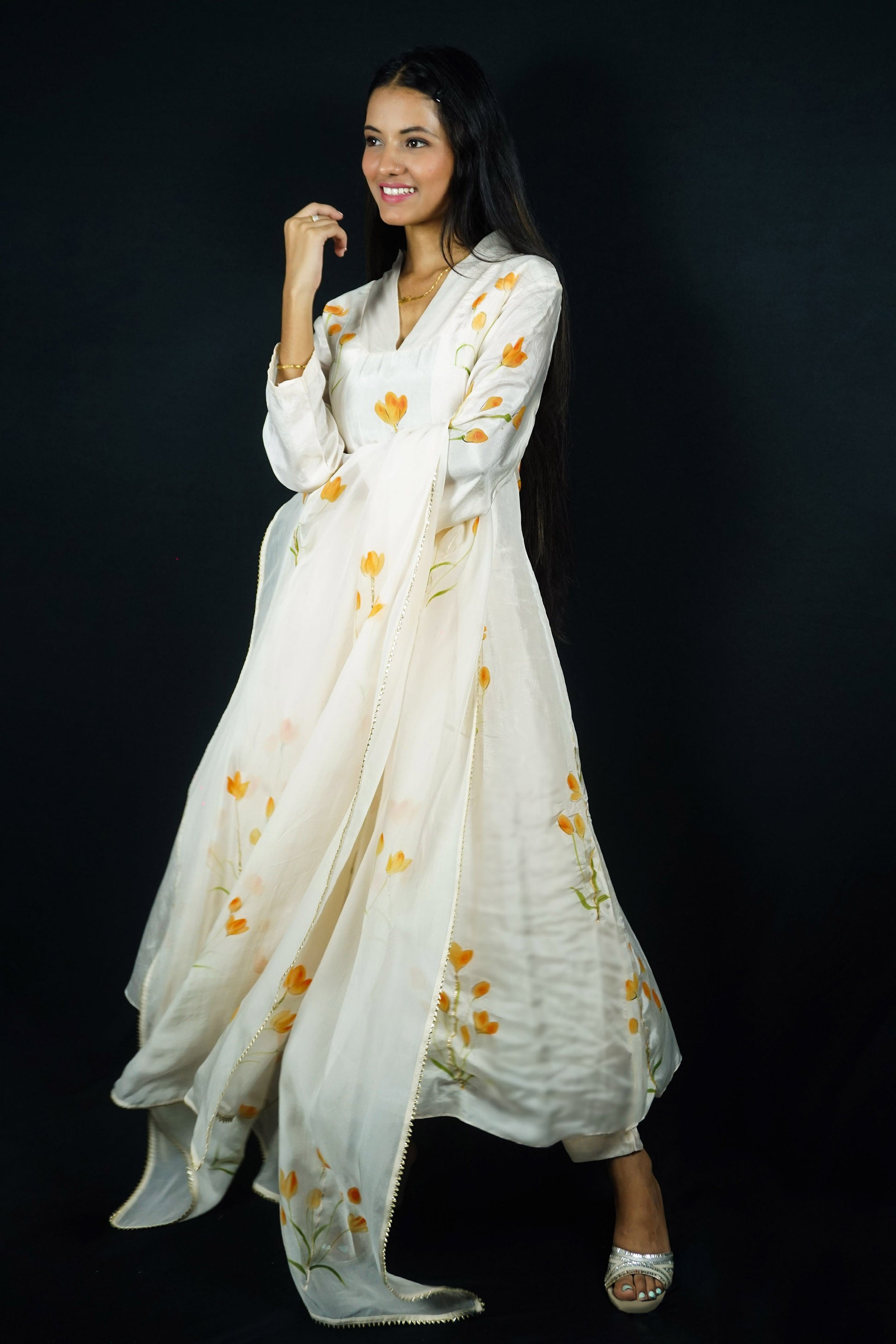 Hand painted suits with dupatta in silk fabric, orange lily flowers painted on silk a-line  suit paired with painted organza dupatta and silk pants