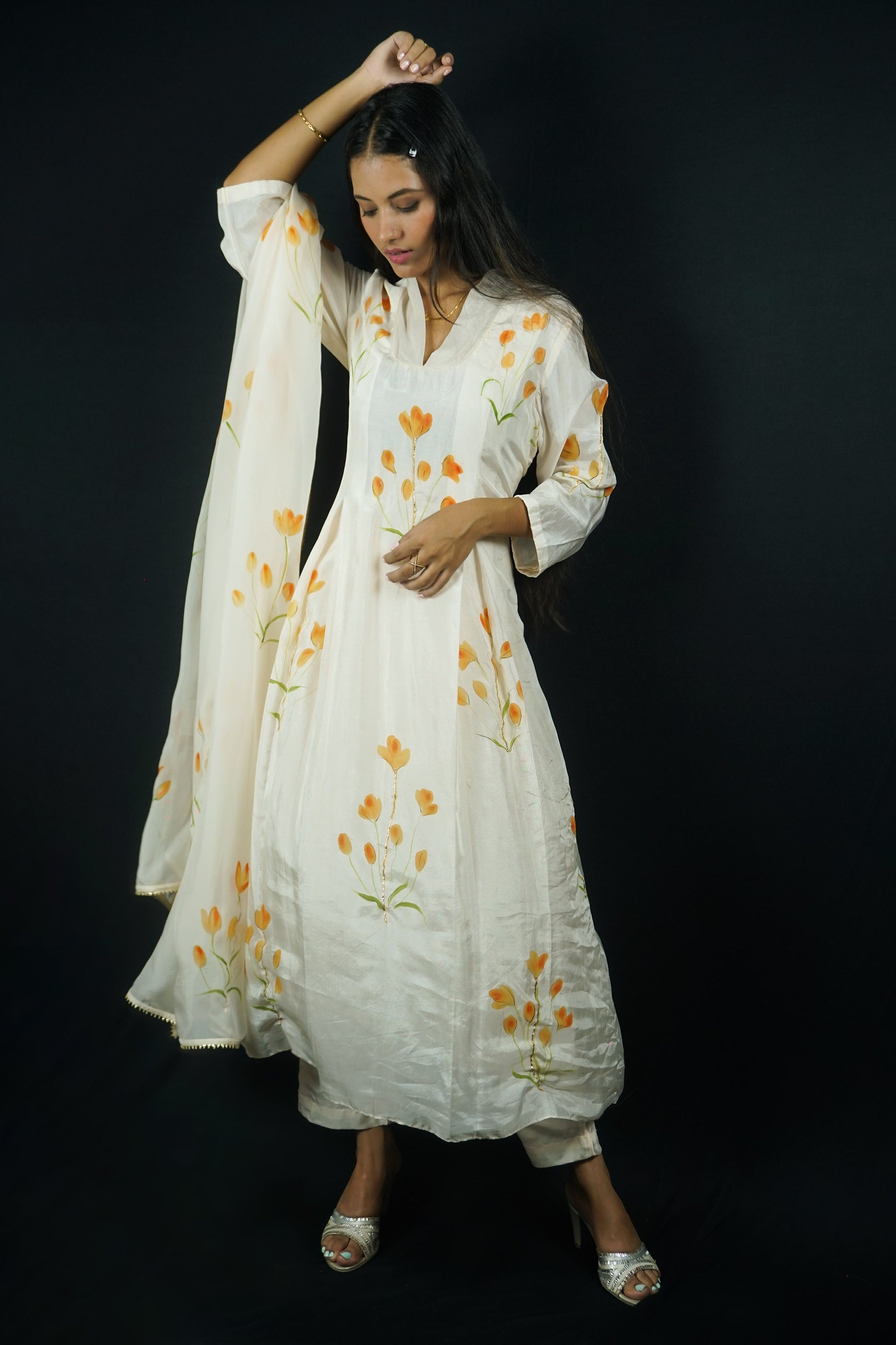 Hand painted suits with dupatta in silk fabric, orange lily flowers painted on silk a-line  suit paired with painted organza dupatta and silk pants