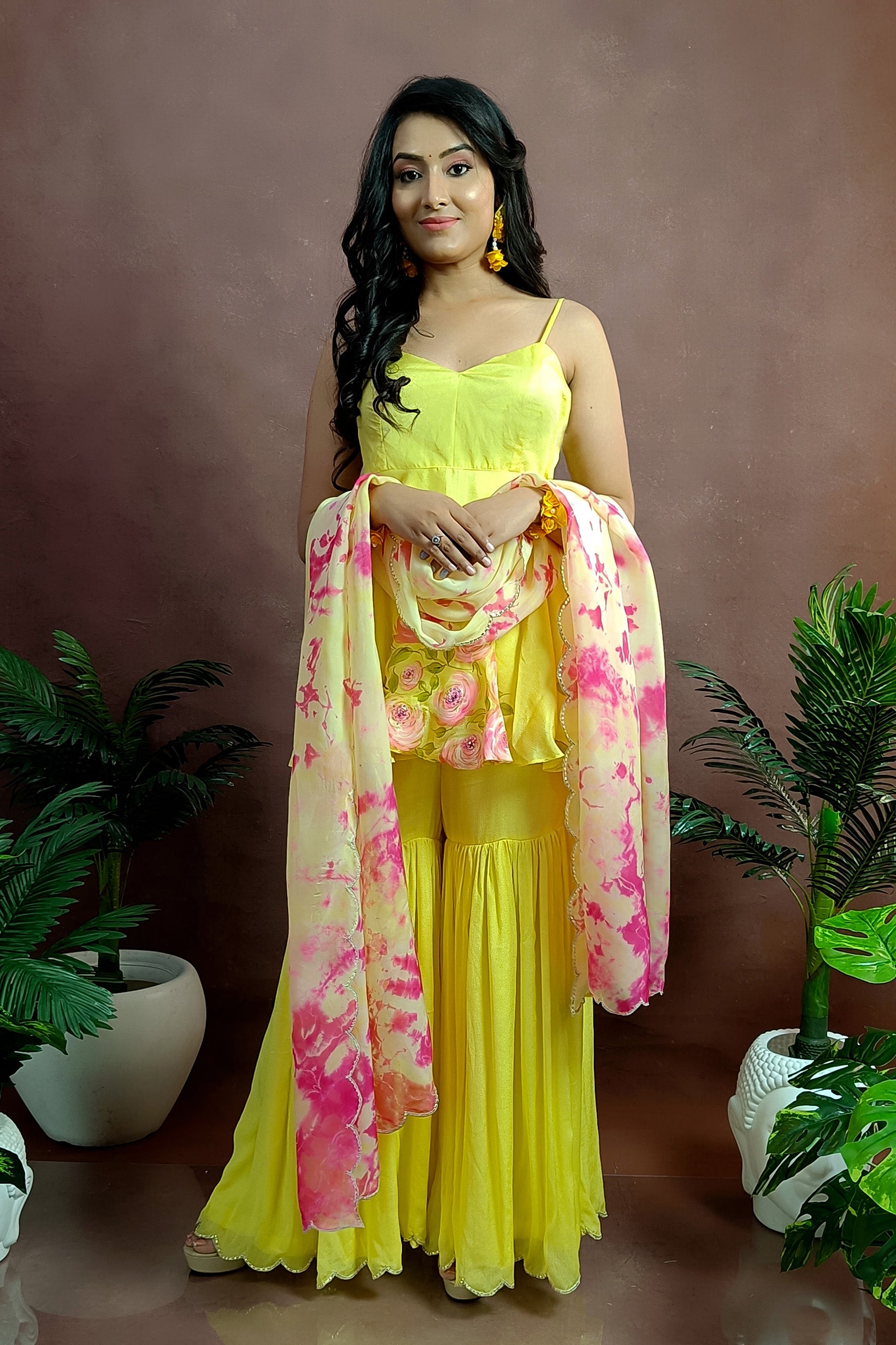 Hand painted yellow rose sharara for haldi function.