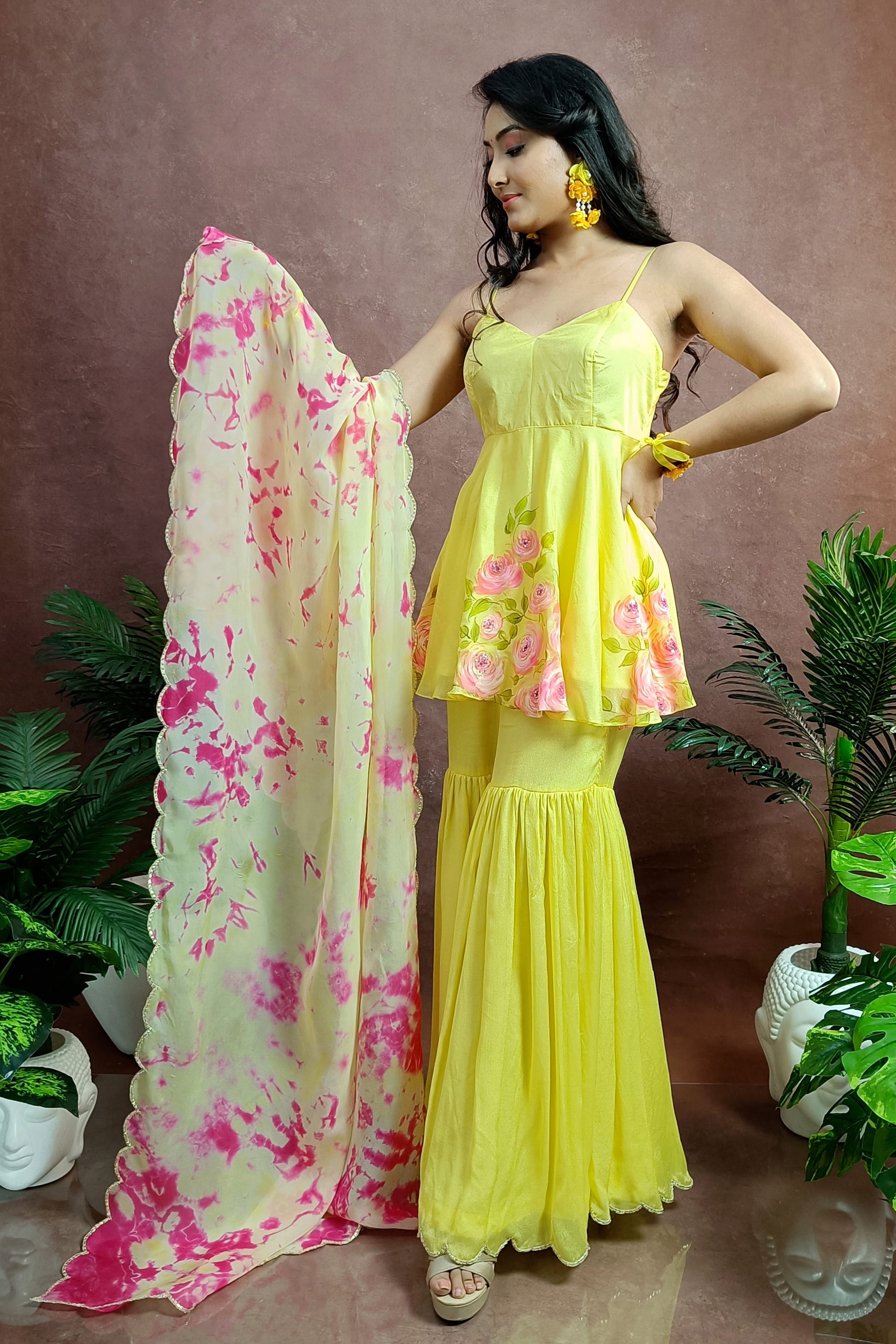 Hand painted yellow rose sharara for haldi function.