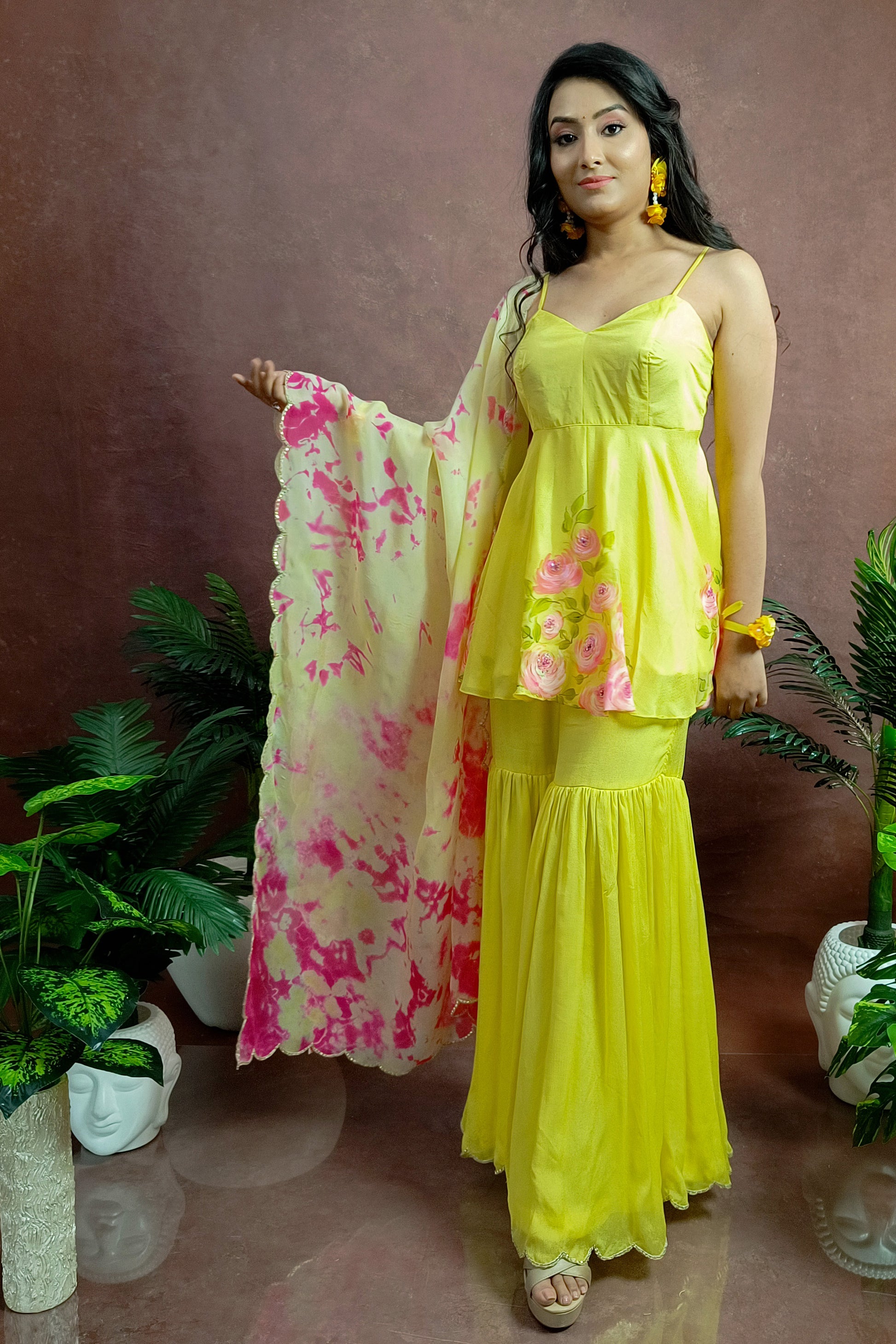 Hand painted yellow rose sharara for haldi function.