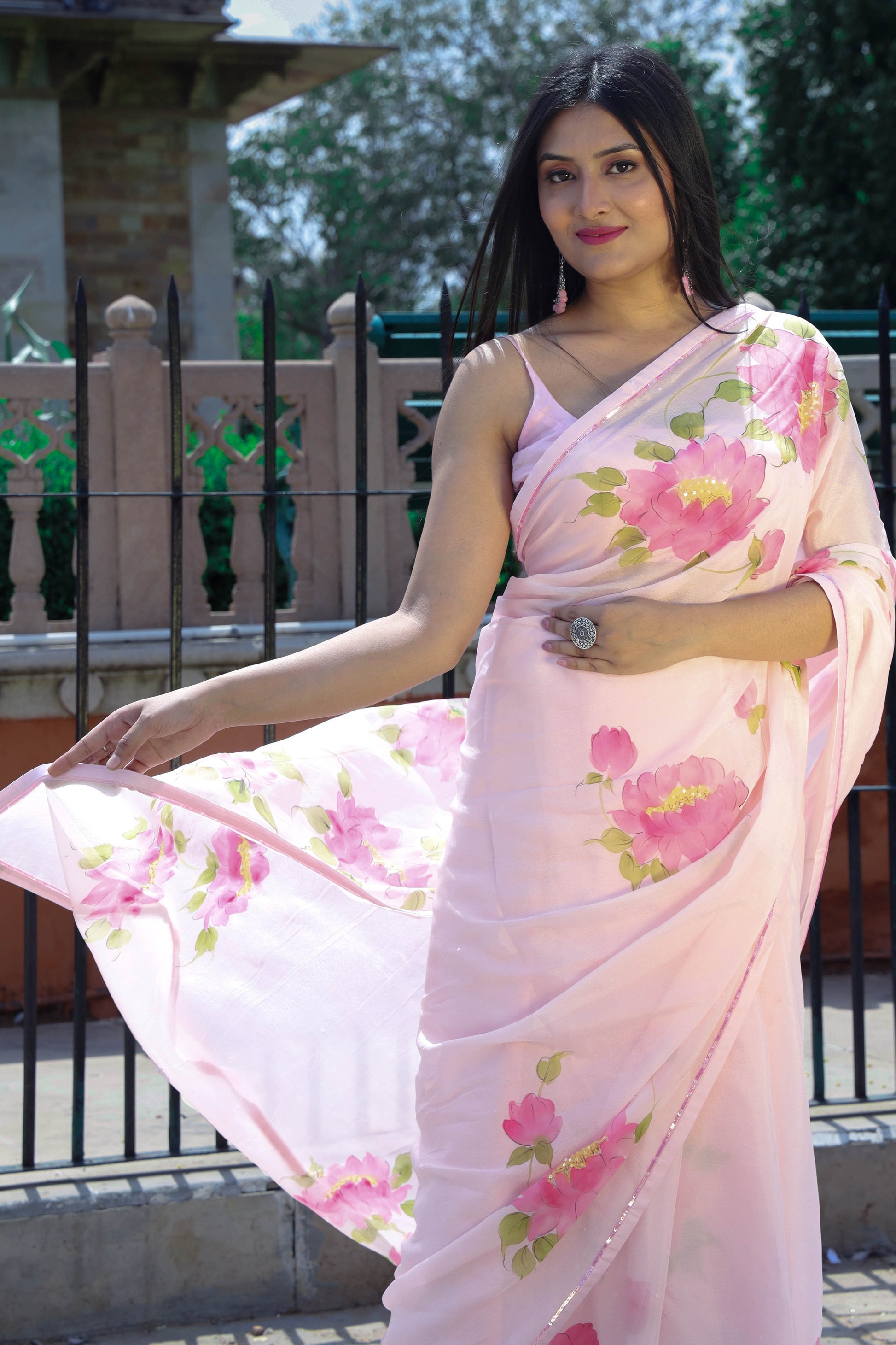 Hand painted wild peony floral saree in chinon chiffon fabric enhanced with sequin and bead hand embroidery.