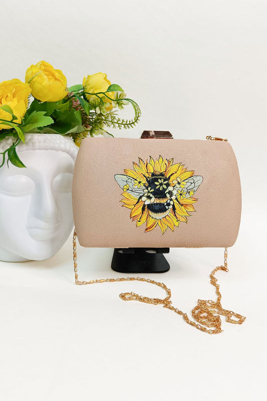 Unique Hand-Painted Canvas Clutch with Sling - Bumble Bee and Sunflower Design. Customized Hand-Painted Purse for a Personalized Touch. Explore Painted Canvas Bags and Bag Design Online. Perfect Evening Clutch for a Stylish Look. Get Your Customized Ladies Purse with Name. Discover the Beauty of Painted Designer Bags. Create Your Own Custom Purse and Customized Bag Near You