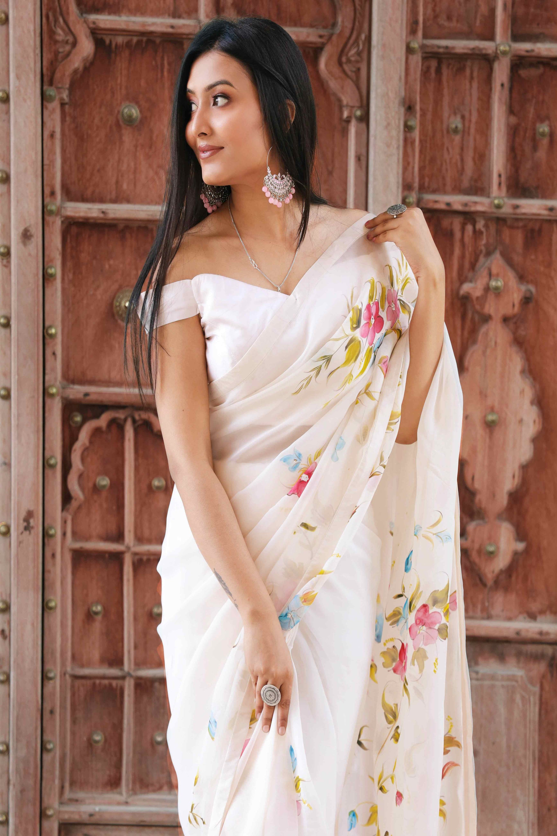 Off-White Organza Saree with Hand-Painted Multi-Color Flowers and Sequin Embroidery - Perfect for a Party, Farewell, or Any Occasion - Latest Saree Blouse Designs - Organza Saree Party Wear - Floral Organza Saree - Easy Hand-Painted Saree Design - Hand Painting on Saree - Elegant Hand-Painted Saree Look