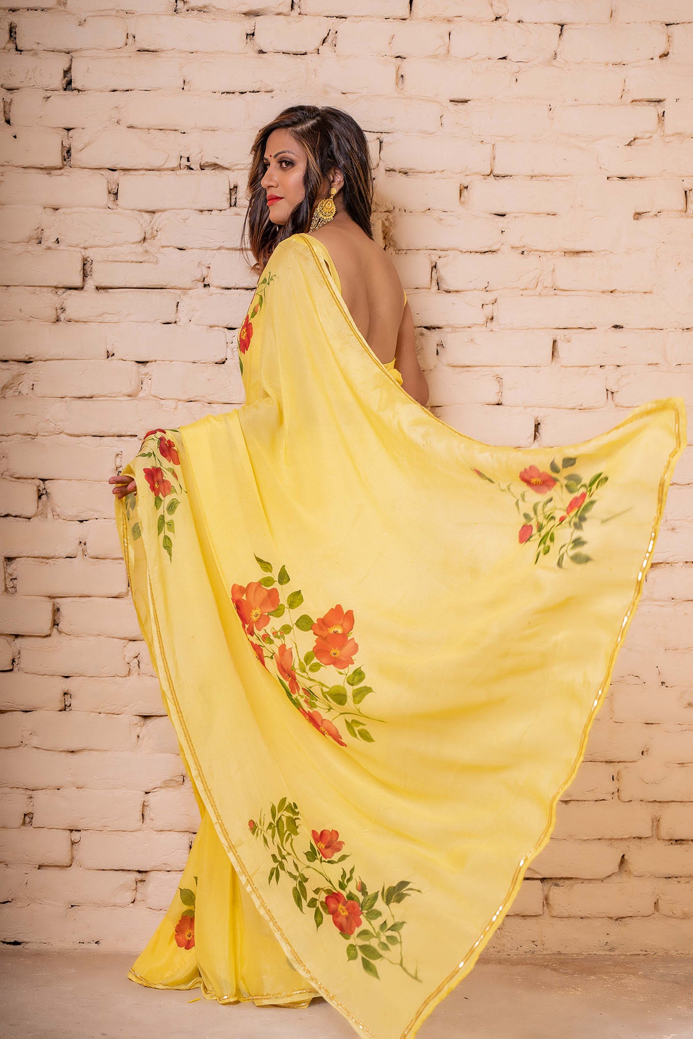 Explore our hand-painted sarees, a fusion of artistry and elegance. Find the perfect hand-paint sari, whether it's a floral chiffon saree for a funky look or a beautiful handloom saree that's trending now. Elevate your style with a Bollywood saree or go rustic with a crêpe silk embroidered saree. Discover the finest in craftsmanship and fashion.