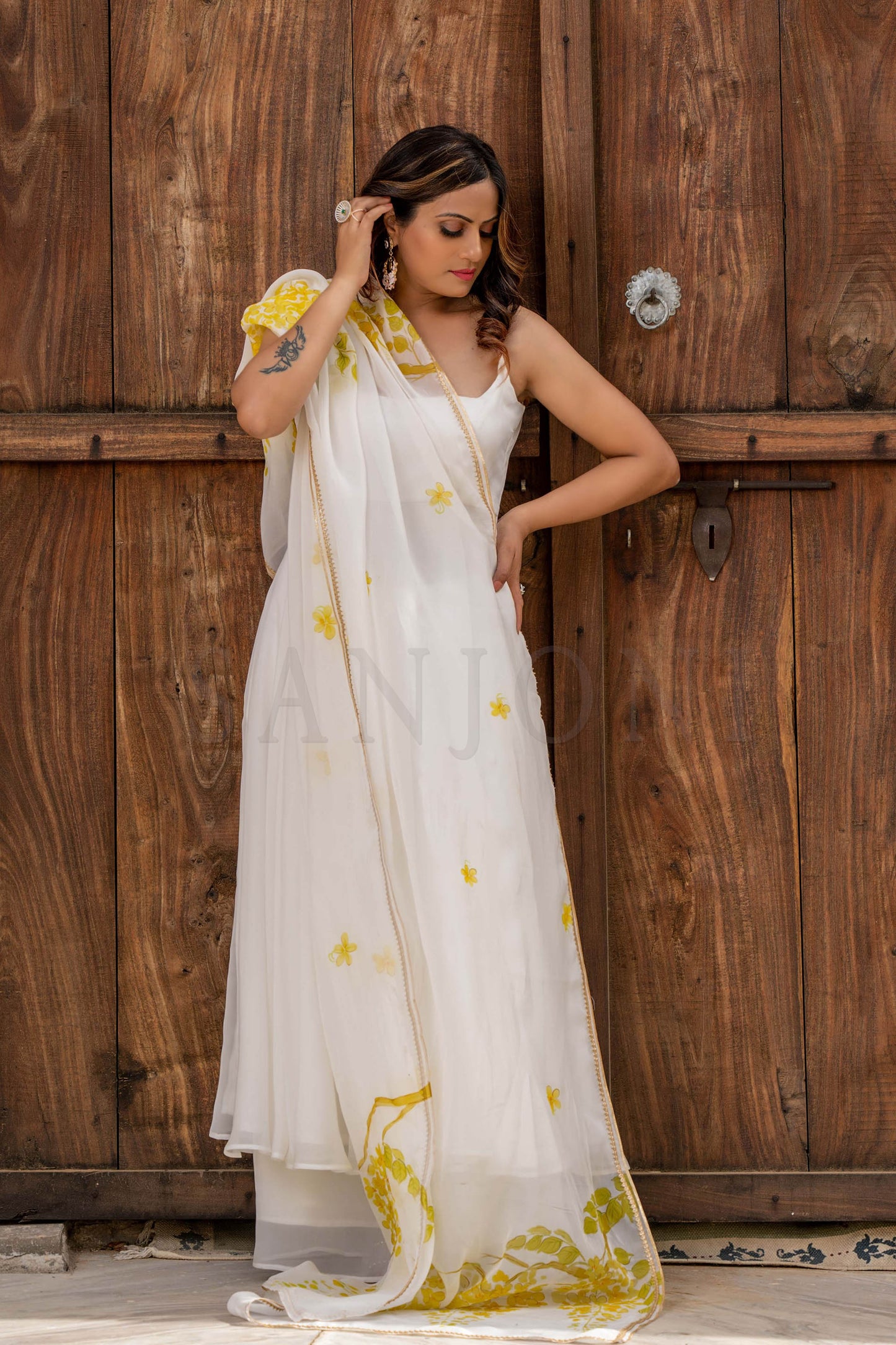 fancy amaltas Hand painted anarkali with palazzo best pick for party wear.