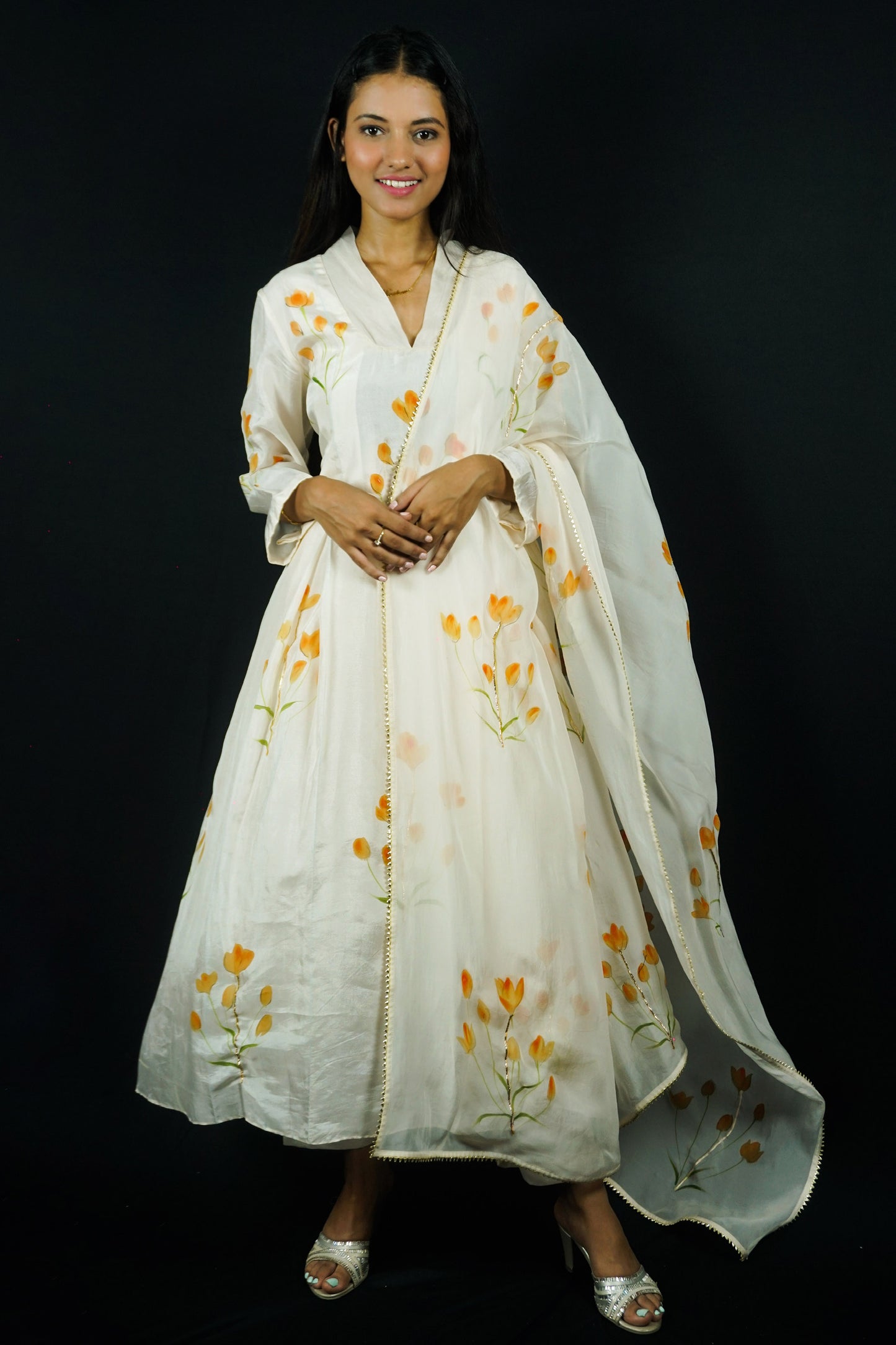 Hand painted suits with dupatta in silk fabric, orange lily flowers painted on silk a-line  suit paired with painted organza dupatta and silk pants