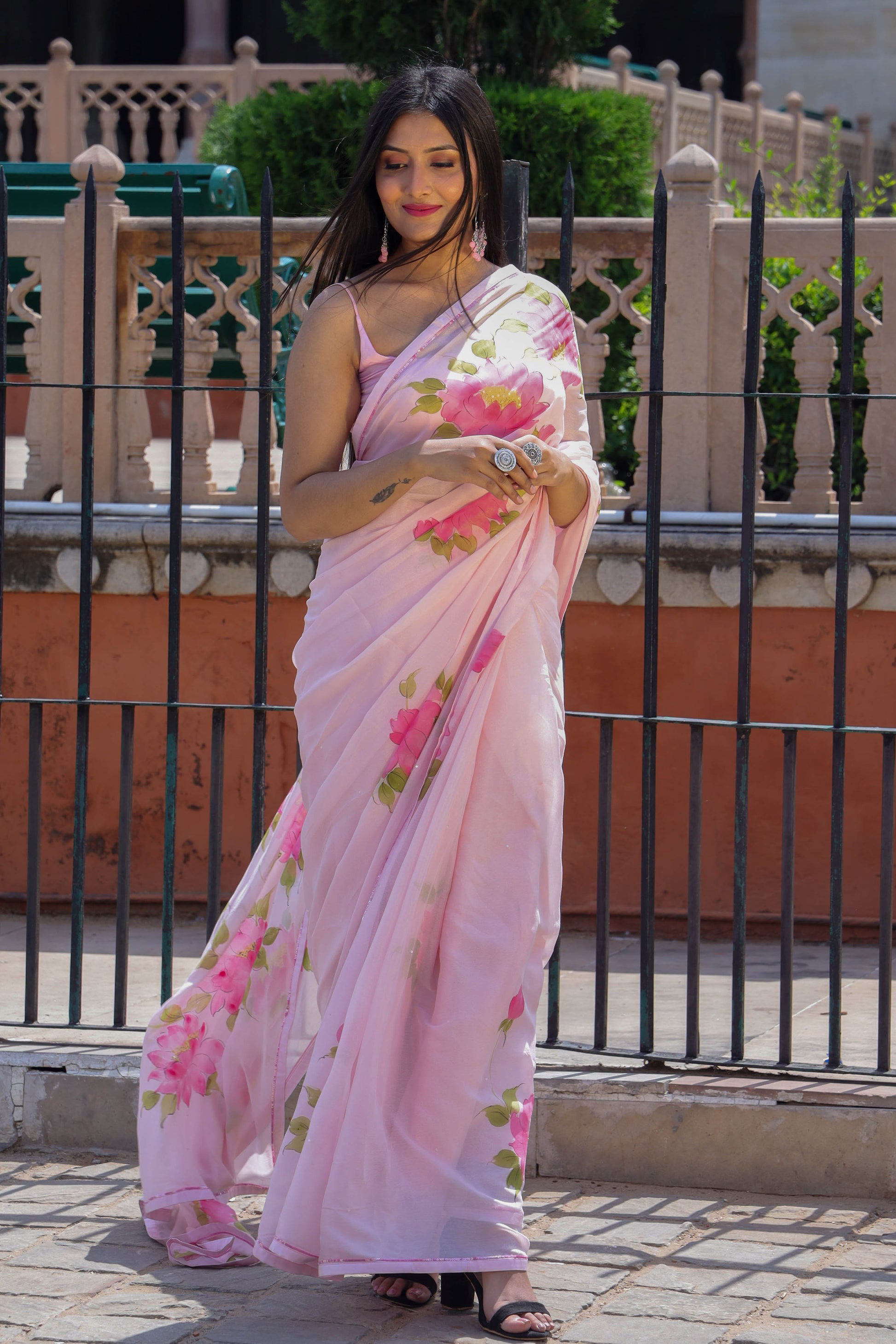 Hand painted wild peony floral saree in chinon chiffon fabric enhanced with sequin and bead hand embroidery.