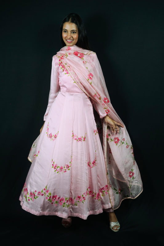 hand painted Anarkali with pants, hand paint rose flowers on pink modal satin paired with kota doria painted dupatta.